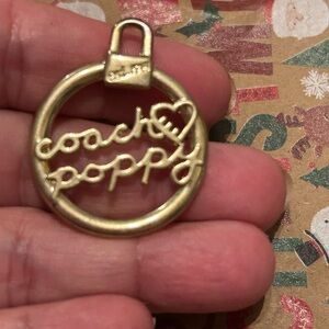 Gorgeous Brass Gold Coach Poppy Charm or necklace pendant with heart
